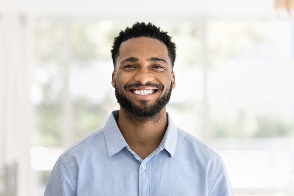 Smiling man indoors