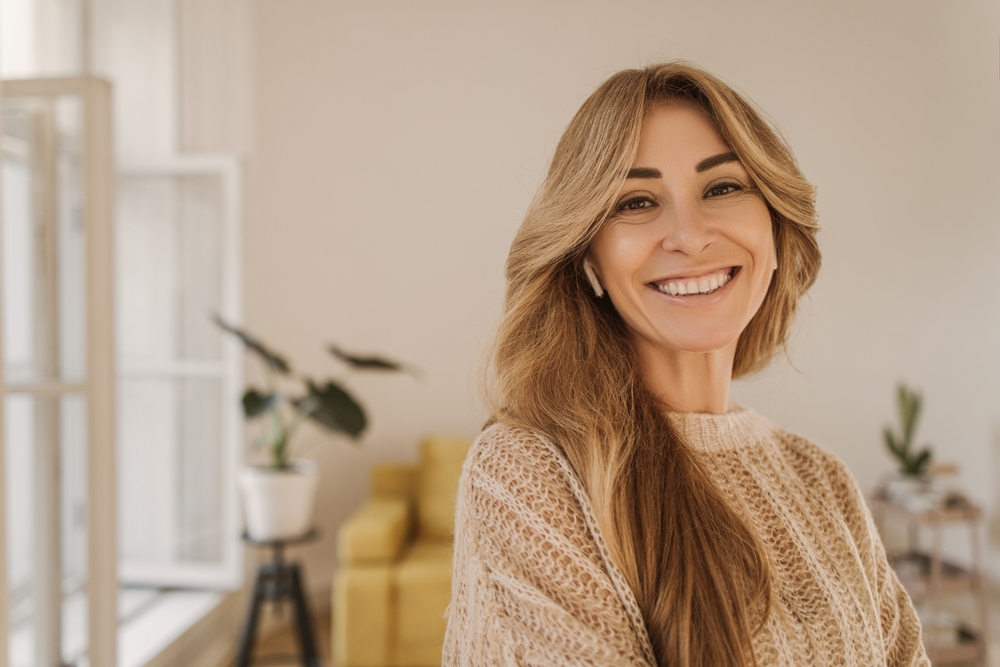Smiling woman indoors